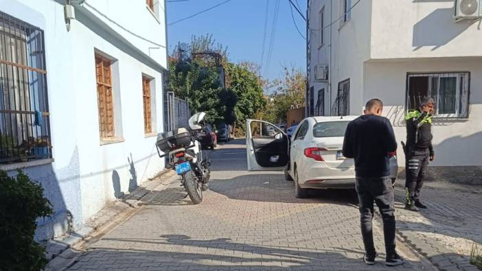 Polis memuru boşanmak isteyen eşinin sokağında ateş açtı