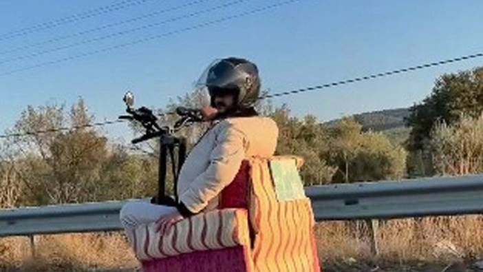 Muğla'da tehlikeli yolculuk: Scooter'a koltuk yükledi