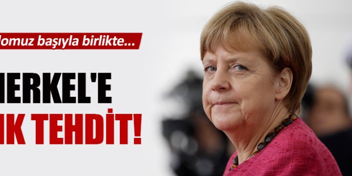 Angela Merkel'e kesik domuz başıyla tehdit