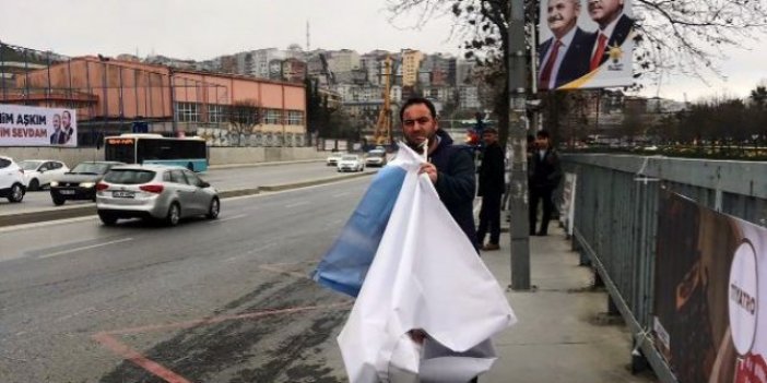Resmi plakalı araçlarla İYİ Parti'nin pankartlarını topladılar