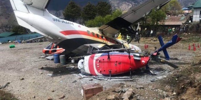 Nepal'de yolcu uçağı pistteki helikoptere çarptı