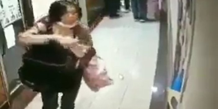 Çinli olduğu öne sürülen kadın korona virüs yaymak için asansöre tükürdü