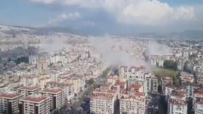Depremin ardından İzmir semalarını toz bulutları kapladı. Yıkılan binalar var
