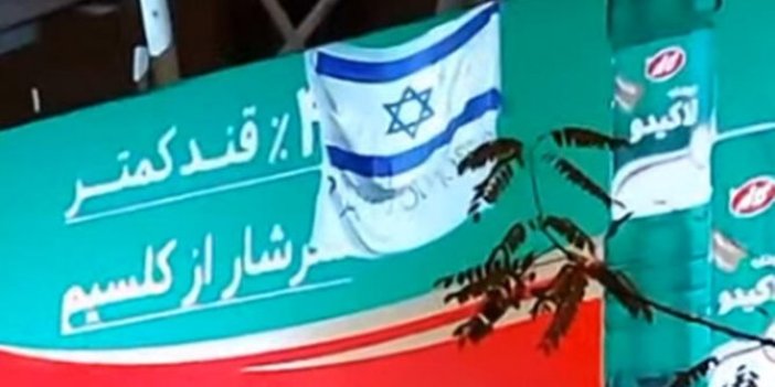 İran'da olay pankart! İsrail bayrağı ile 'Teşekkürler Mossad' yazısı asıldı