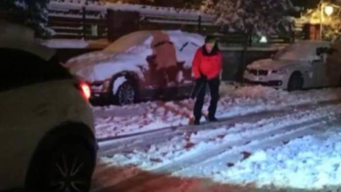 Karlı yolda cipin arkasına bağladığı iple snowboard yaptı