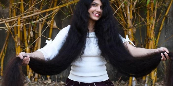 Dünyanın en uzun saçlı kadını saçlarını kestirdi