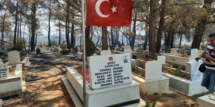 Uzman Çavuş'un kabri ve Türk Bayrağı yanmadı