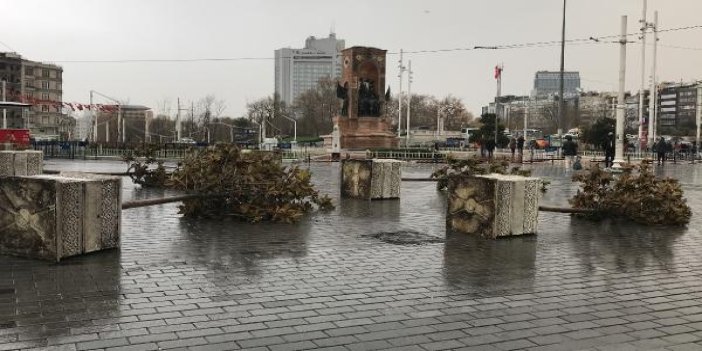 Fırtına Taksim'de dev saksılardaki ağaçları devirdi