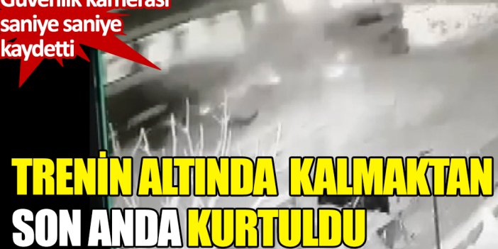 Trenin altında kalmaktan son anda kurtuldu! İşte o görüntüler