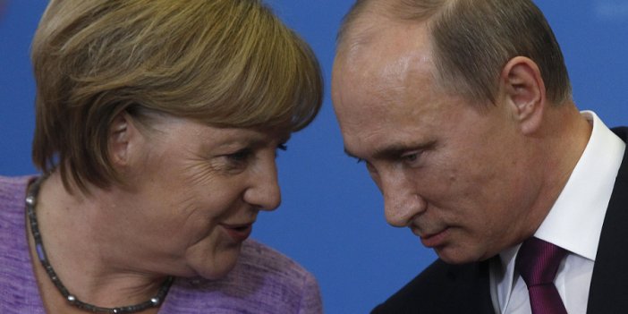 Merkel Putin'i kınadı
