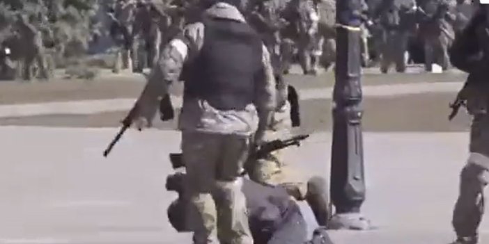 Rus askerleri işgali protesto eden sivili darp etti! Kırımlı Gazeteci Gülsüm Khalilova paylaştı