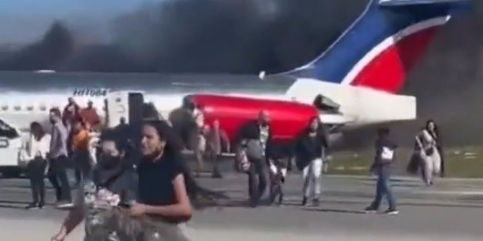 Alev alev yanan uçak Miami'deki Havalimanı'na gövdesinin üzerine indi. Havada facia