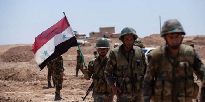 Esad'ın askerleri sınıra konuşlandı. Haberi Reuters geçti