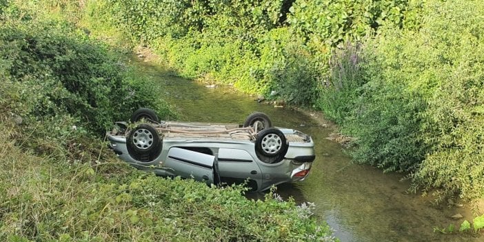 Otomobil dereye uçtu, sürücü burnu bile kanamadan kurtuldu