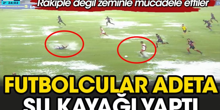 Futbol sahası denize döndü. Futbolcular adeta su kayağı yaptı