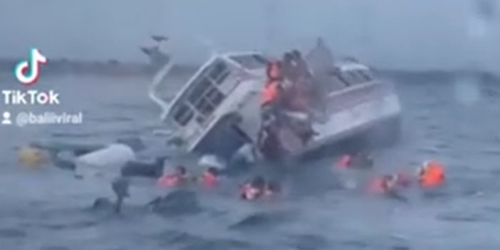 Büyük dalganın çarptığı sürat teknesi alabora oldu. Yolcular kendilerini kurtarmak için çırpındı