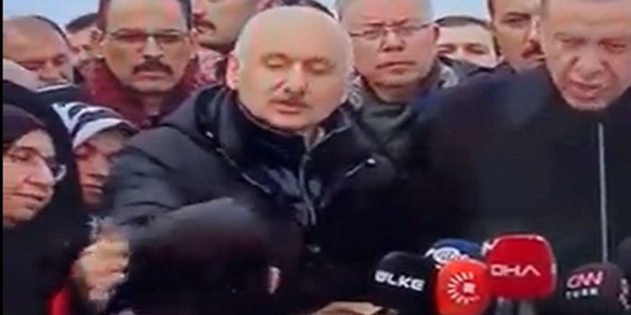 Erdoğan konuşurken Ulaştırma Bakanı üşüyen çocuğun kapüşon ve beresini çıkardı