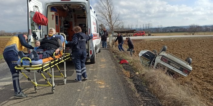 Kontrolden çıkan otomobil takla atıp tarlaya devrildi