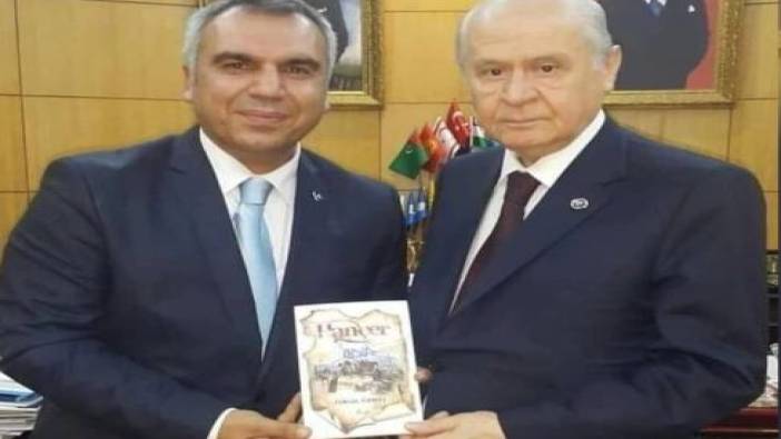 MHP'li aday kendisiyle aynı isme sahip ölen yazarın kitabını sahiplendi. Kitabı da Bahçeli'ye hediye etti