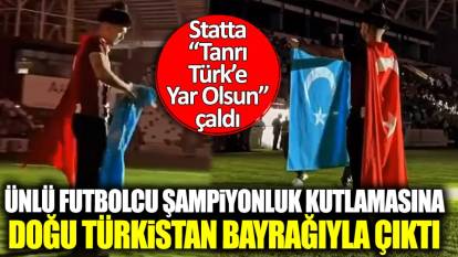 Ünlü futbolcu şampiyonluk kutlamasına Doğu Türkistan bayrağıyla çıktı