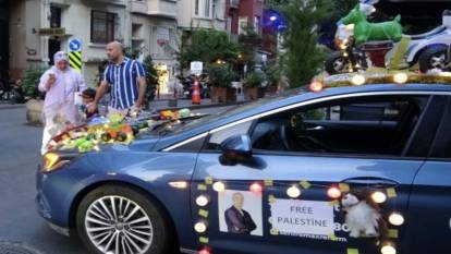 Filistinli çocuklar için arabasını oyuncaklarla doldurdu