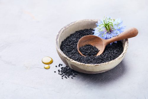 black-cumin-seeds-with-nigella-sativa-flower-and-o-2021-10-21-02-34-49-utc.jpg