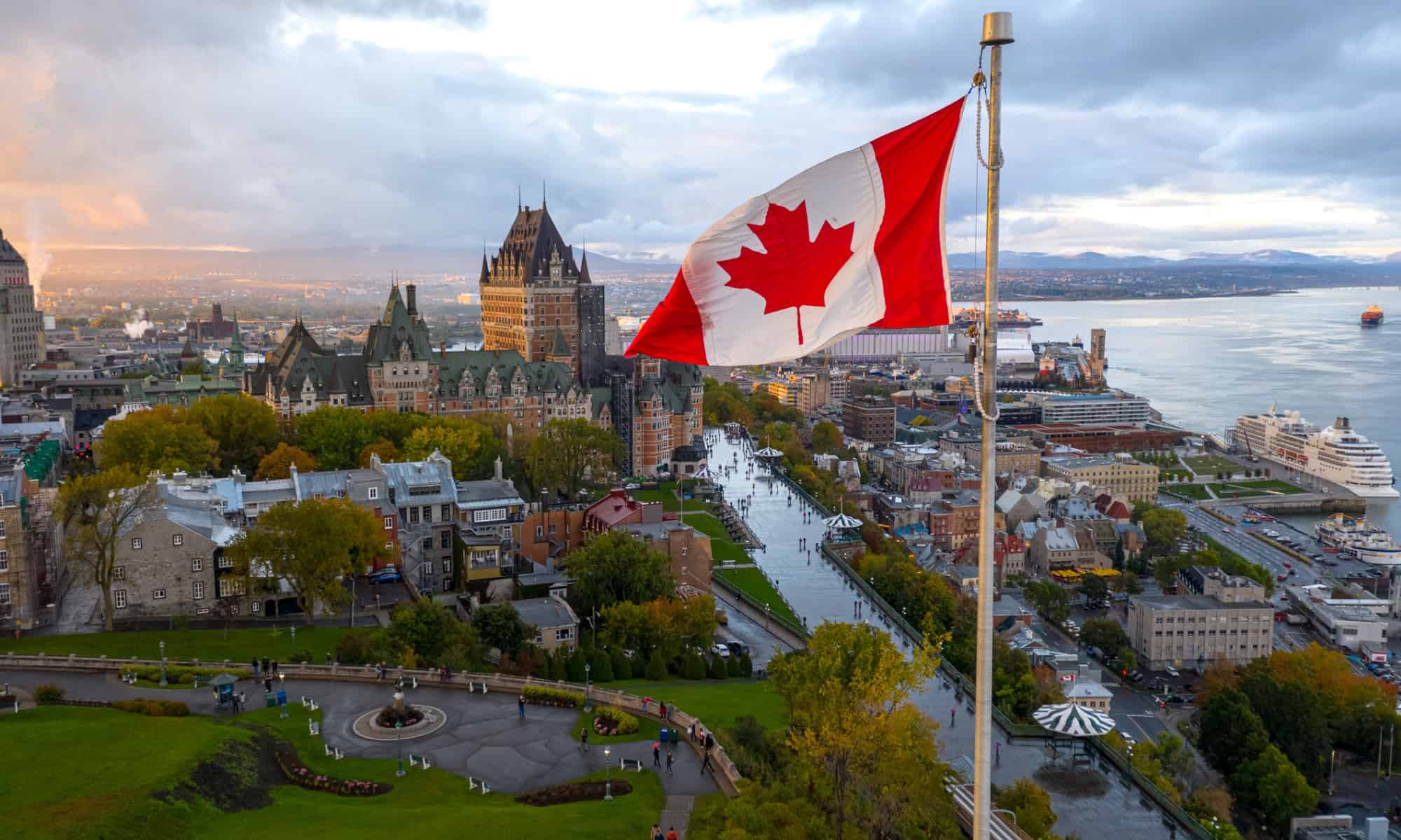 canadian-flag-flying-over-old-quebec-city-jpg-s1024x1024wisk20cr87p30hqqdwxqfxbaoba3ydcahlq8dn7tgtoxqfzm5u.jpg