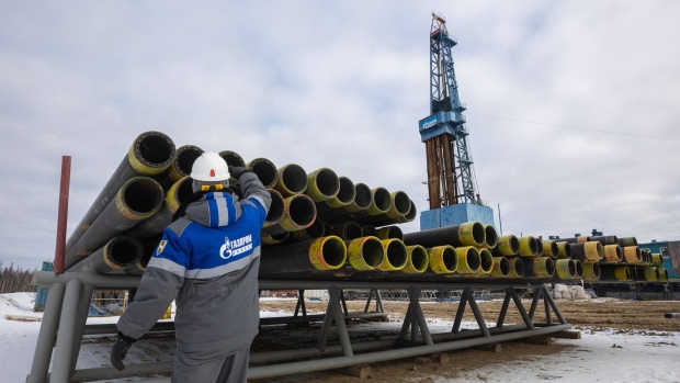 a-worker-inspects-drilling-pipes-at-a-gas-drilling-rig-on-the-gazprom-pjsc-chayandinskoye-oil-gas-and-condensate-field-a-resource-base-for-the-power-of-siberia-gas-pipeline-in-the-lensk-district-of-the-sakha-republic.jpg