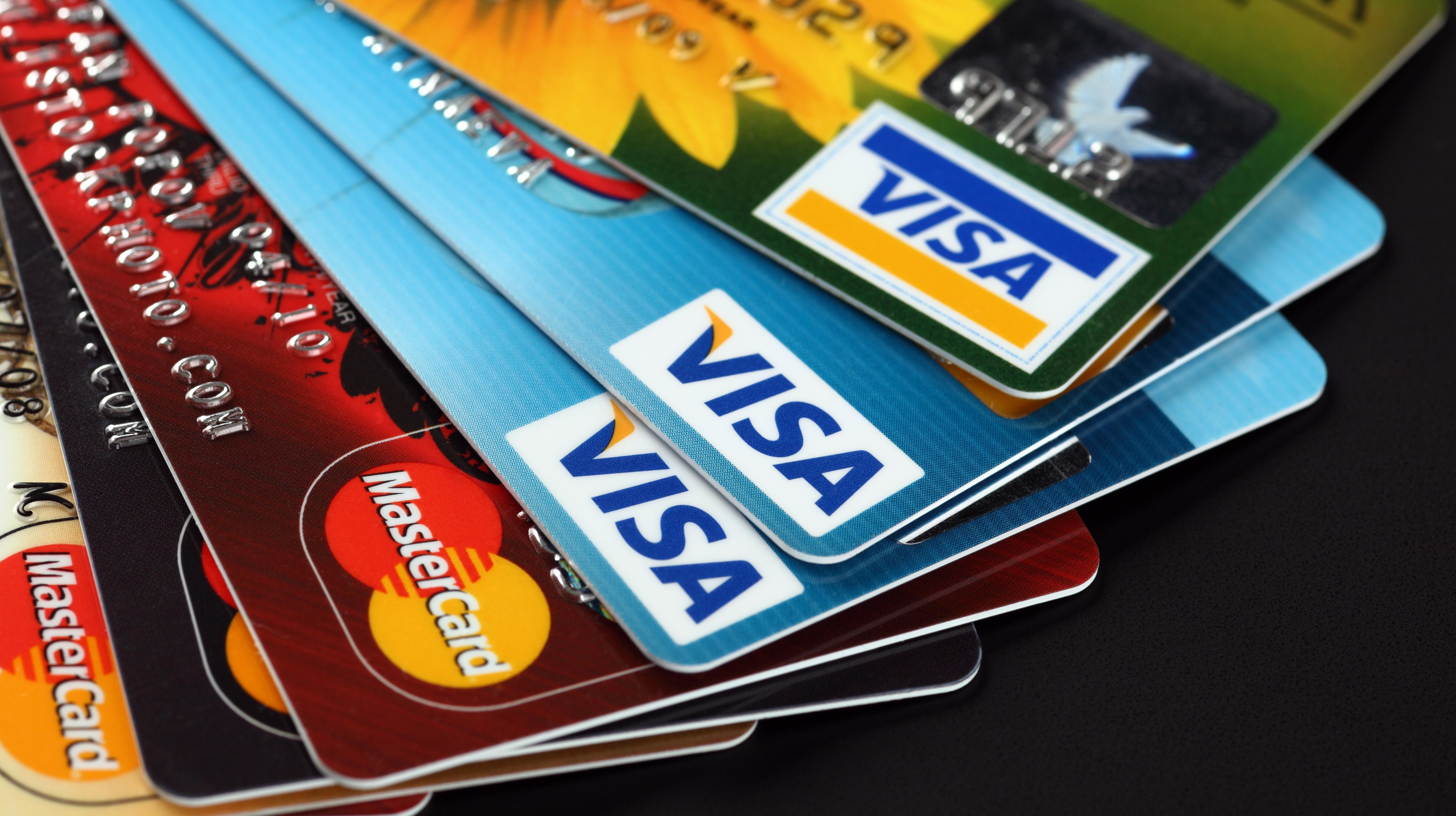 815209-plastic-visa-credit-cards-closeup.jpg