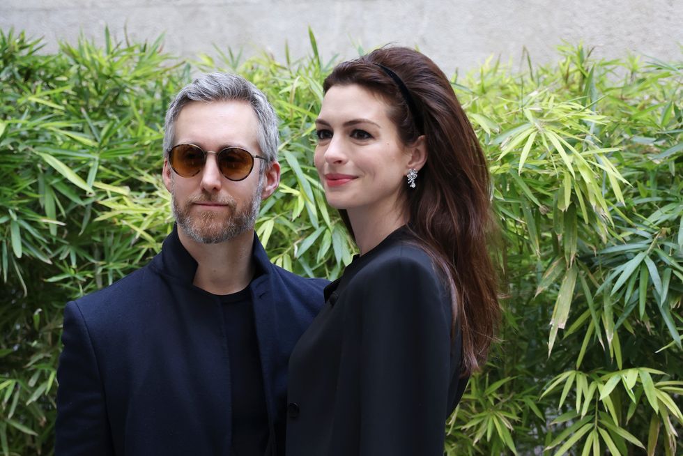 adam-shulman-and-anne-hathaway-are-seen-on-the-front-row-of-news-photo-1647631890.jpg
