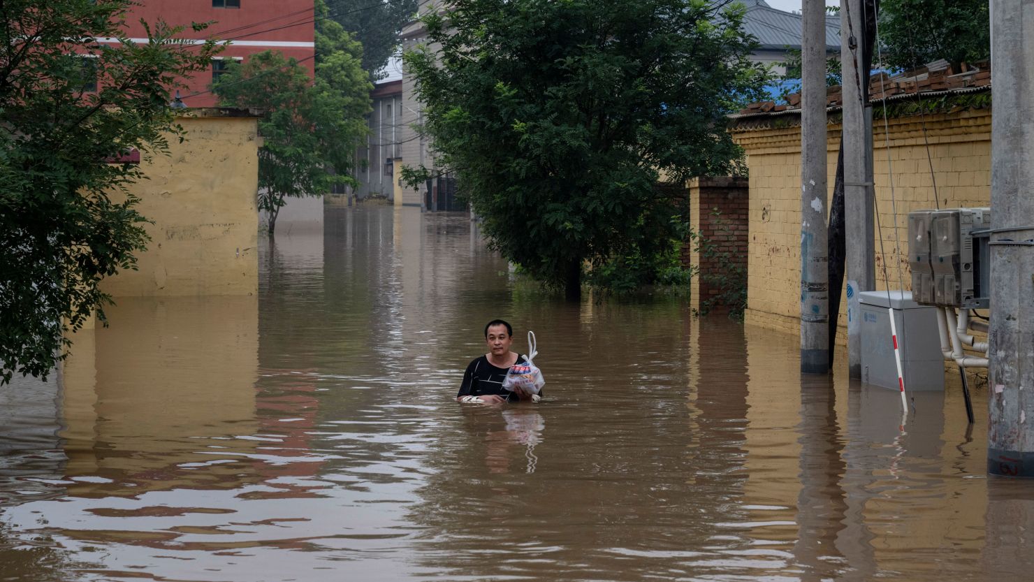 230803232434-01-china-hebei-flood-rescue-intl-hnk.jpg