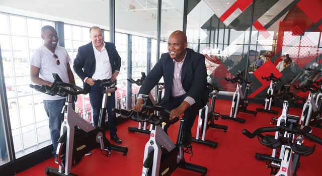 t2-assistant-minister-of-health-dr-alfred-madigela-trying-out-the-spinning-bicycle-at-the-official-opening-of-virgin-active-gym-over-the-weekend-at-aiport-junction-mall-pic-kefilwe-monosi.jpg