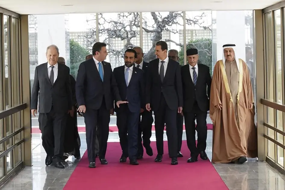 202302mena-syria-bashar-alassad-with-delegation.webp