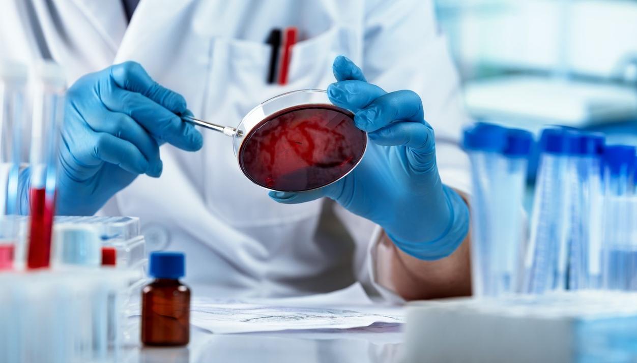 lab-worker-with-petri-dish.jpg