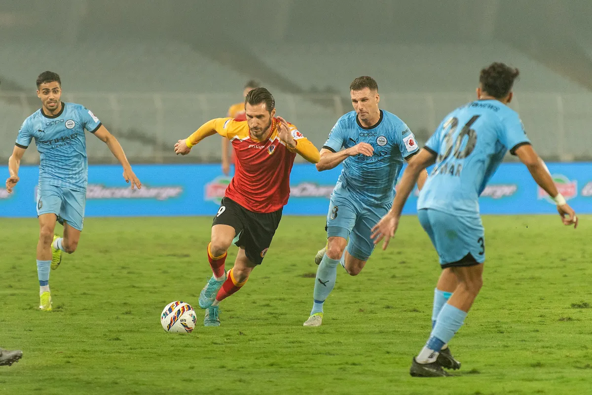 ebfcs-dimitrios-diamantakos-dribbling-with-the-ball-against-mcfcs-vikram-partap-singh-yoell-van-nieff-and-sahil-panwar-at-vivekananda-yuba-bharati-krirangan-stadium-kolkata-on-monday.webp