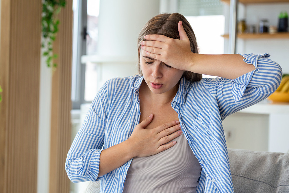 breathing-respiratory-problem-asthma-attack-pressure-chest-pain-sun-stroke-dizziness-concept-portrait-woman-received-heatstroke-hot-summer-weather-touching-her-forehead.jpg