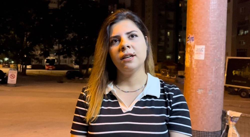 Güvenlik görevlisi kadının canını zor kurtardı! Sokak köpeği birden üstüne atladı